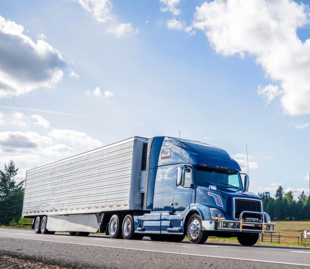 Truck driving on a highway, symbolizing fleet operations and ELD compliance